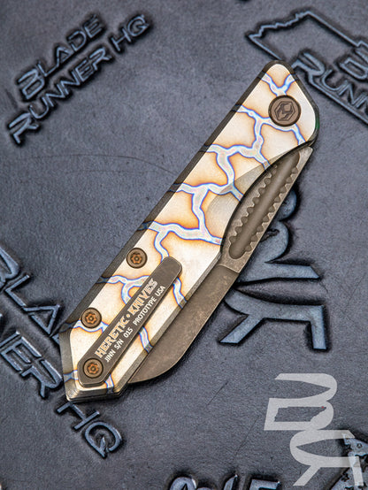 Pre Owned Heretic Knives Jinn Prototype Flamed Titanium w/ Bronze Accents & Hand Ground Battle Bronze Magnacut