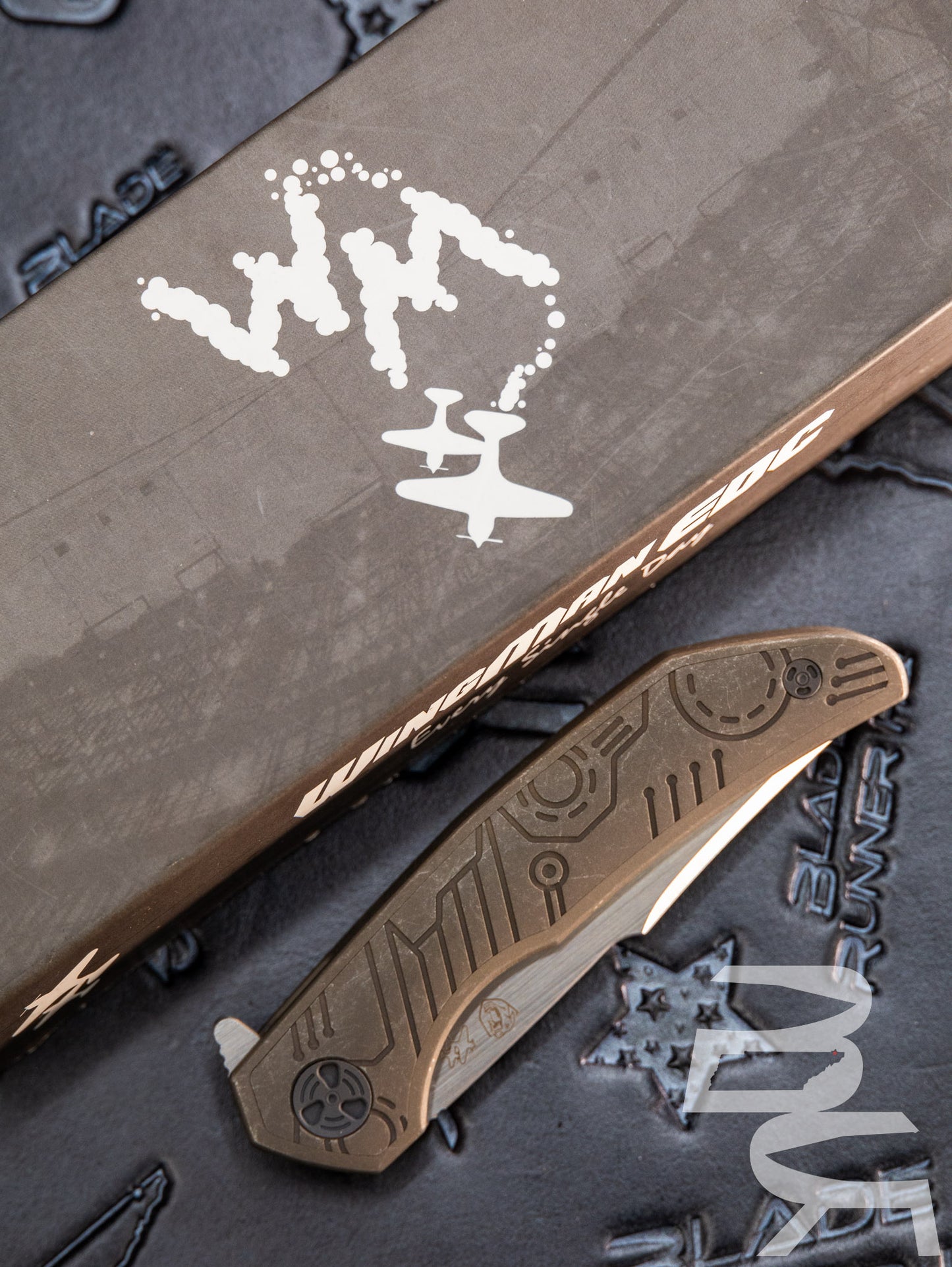 Pre Owned WingManEDC John Barker Ferus KickStop Flipper Knife 3" M390 Compound Tanto Blade, Integral Titanium Handles with 3D Bronze Titanium Inlays, Frame Lock - WME-FERUS-MTBRT