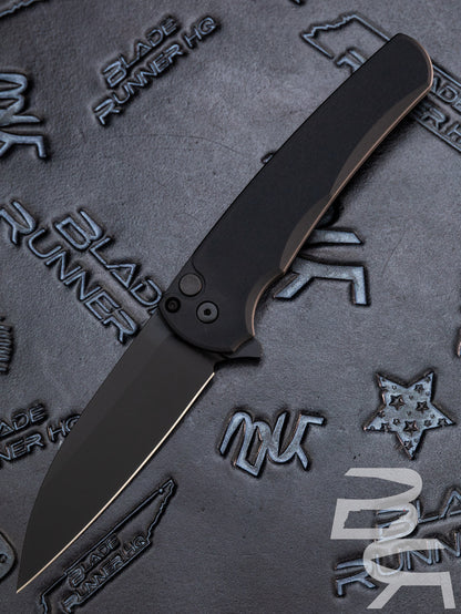 Pro-Tech 5303 Malibu Manual Flipper Knife 3.30" CPM-MagnaCut Black DLC Wharncliffe Blade, Black Aluminum Handles , Button Lock