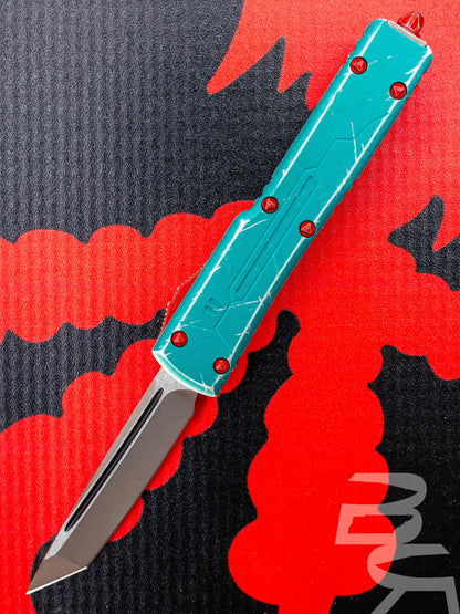 Microtech Knives UTX-70 T/E Bounty Hunter Pattern Aluminum Body w/ Apocalyptic Plain Edge Blade (2.42”) 149-10BH