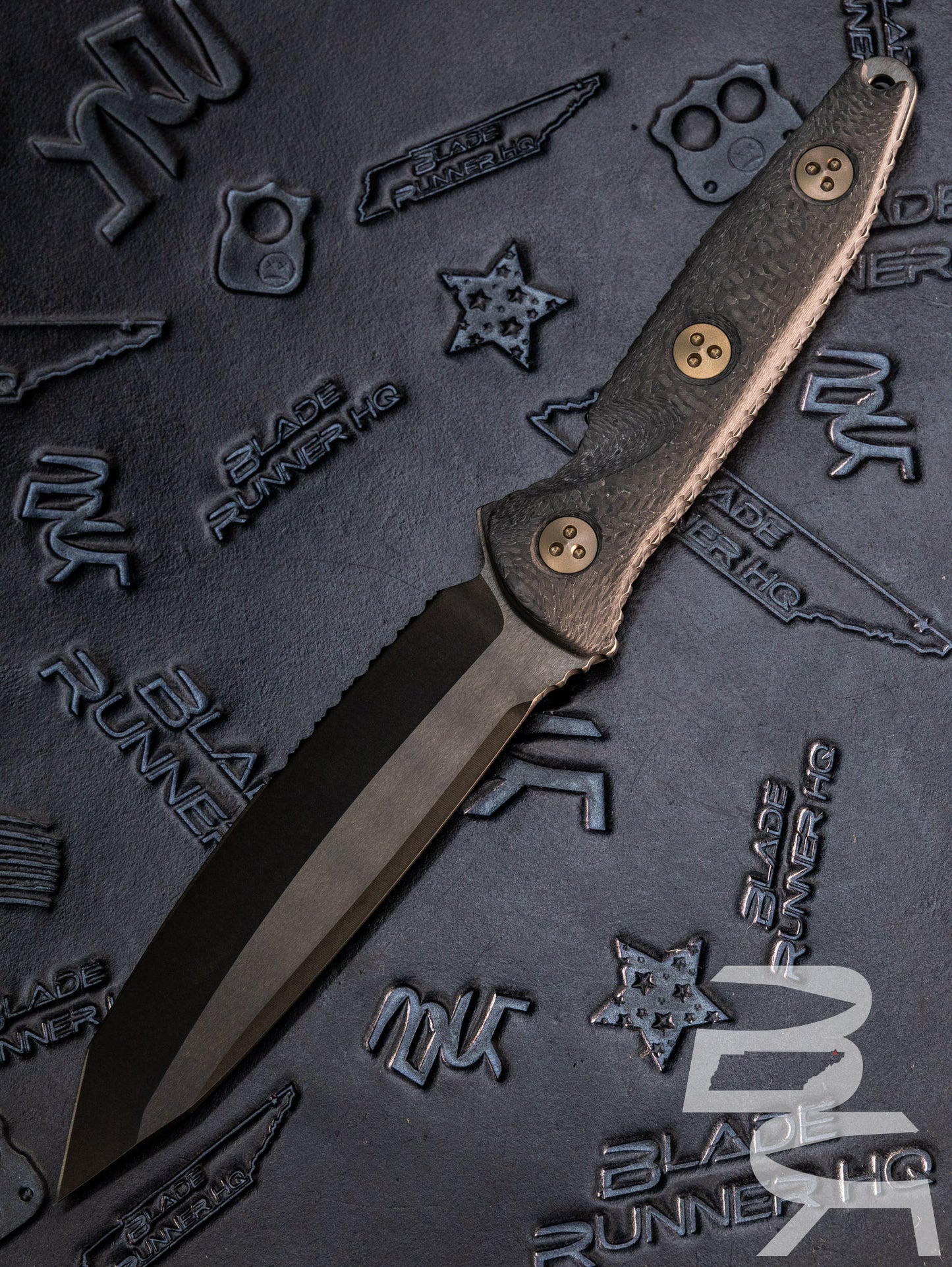 Microtech 114-2DLCCFS Signature Series Socom Alpha Fixed Blade Knife 5.45" Black DLC Tanto Combo Blade, Carbon Fiber Handles, Kydex Sheath
