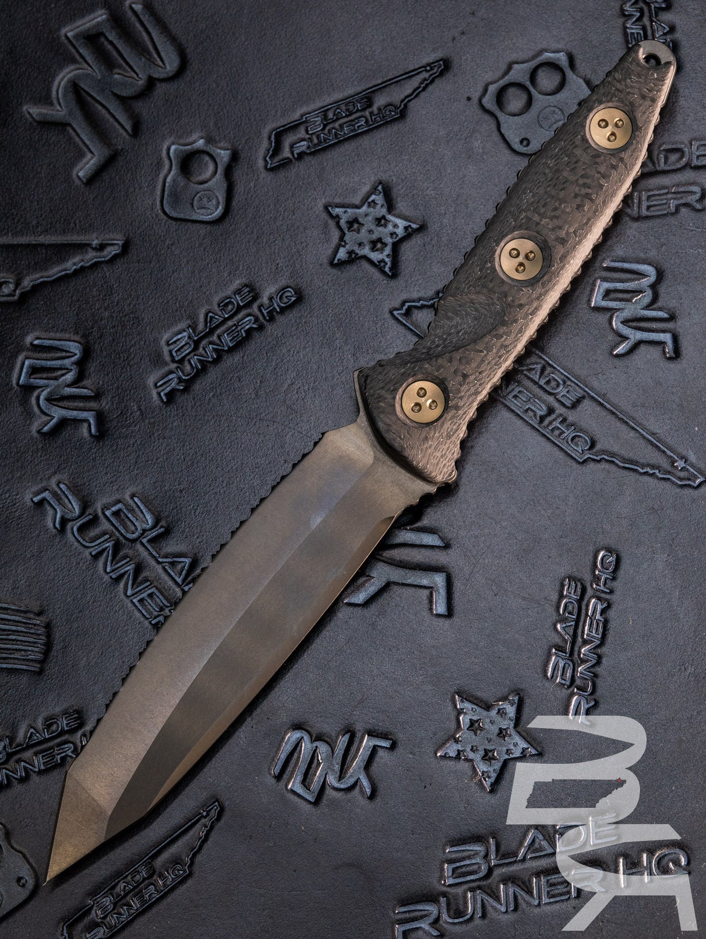 Microtech 114-3DLCCFS Signature Series Socom Alpha Fixed Blade Knife 5.45" Black DLC Tanto Serrated Blade, Carbon Fiber Handles, Kydex Sheath