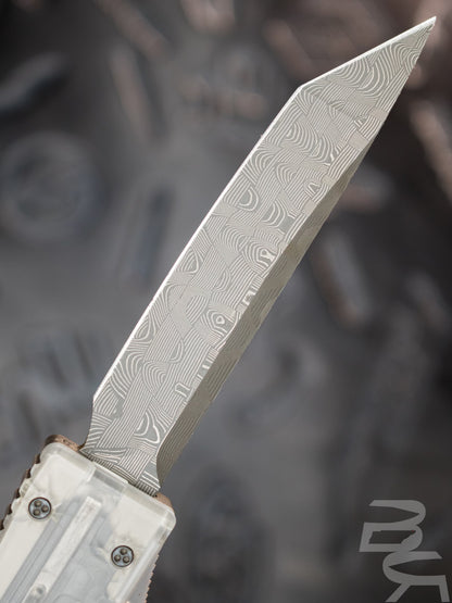 Pre Owned Microtech Ultratech Tanto T/E Clear Top Clear Button Devin Thomas Damascus SN:086 See Pics